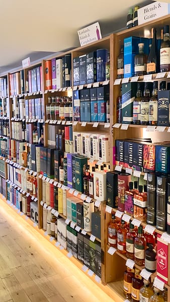Some of the whisky selection at Glasgow's Good Spirit Company - showing shelves stacked with whisky bottles