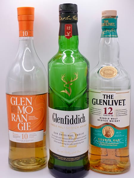 image of three whisky bottles: Glenmorangie 10, Glenlivet 12 and Glenfiddich 12