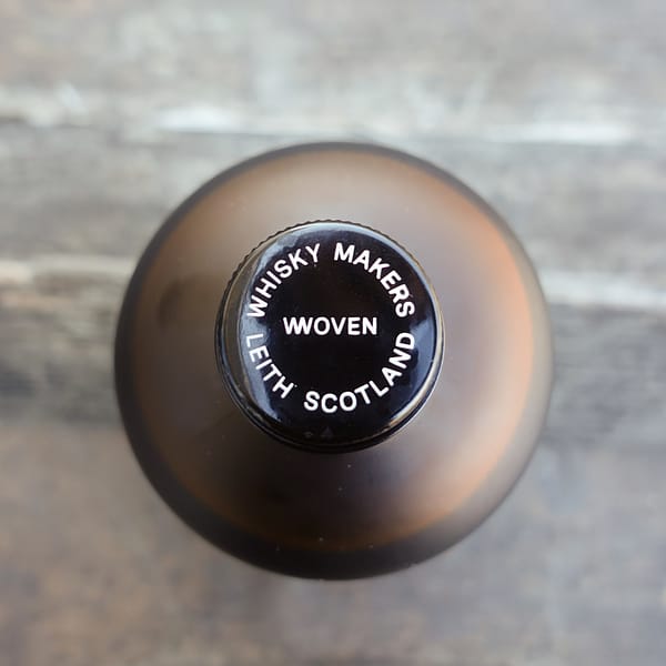 Woven Superblend cap carrying the wording "Whisky makers, Leith Scotland"