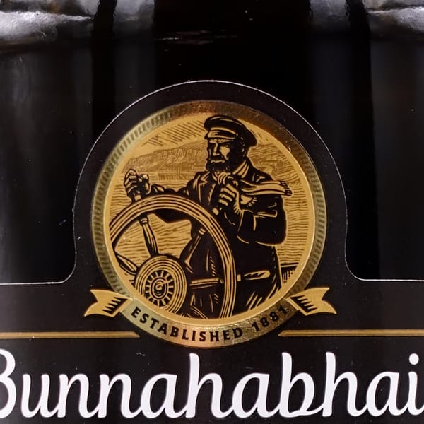 Bunnahabhain 12 year old label - image of the helmsman, or Stiuireadair in Scots.