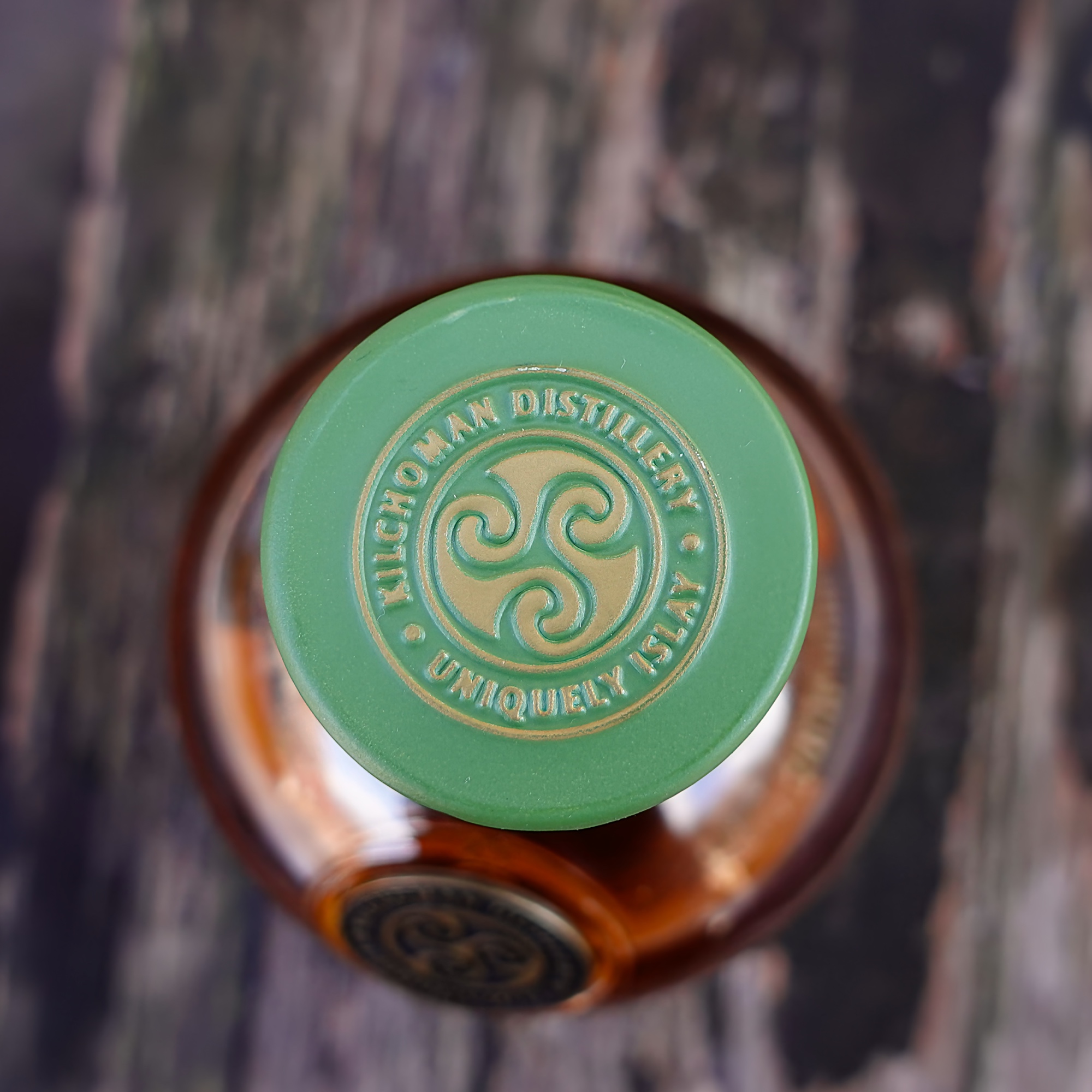 Kilchoman Batch Strenght cap showing the distillery logo