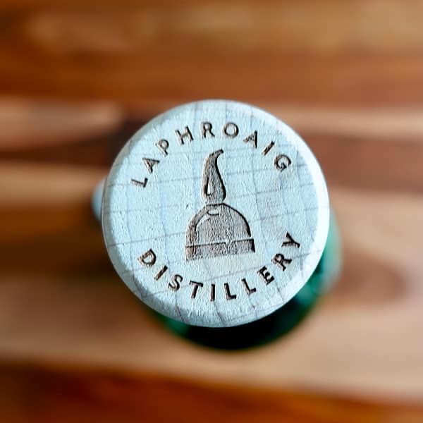 Laphroaig 10 Cask Strength cap showing the distillery logo (2023 rebrand).