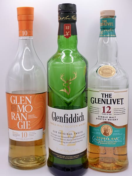 image of three whisky bottles: Glenmorangie 10, Glenlivet 12 and Glenfiddich 12