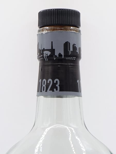 Detail of the Glasgow skyline on Auchentoshan 12 cap seal