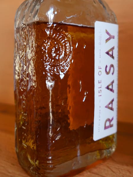 Isle of Raasay R02.1 glass bottle detail showing an imprint of an ammonite fossil