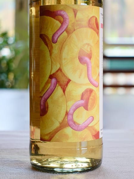 Thompson Bros Craigellachie 2012 11 year old label art depicting pineapple slices and earthworms