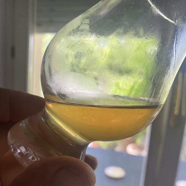 Picture of the Scotch mist, or haziness, appearing in a in a dram of Arran 10 year old after placing the glass for 10 minutes in the fridge