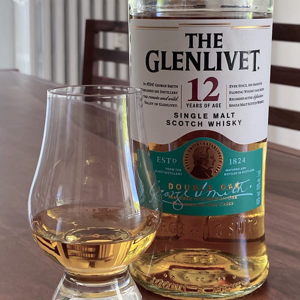 Pic of the Glenlivet 12 Double Oak whisky bottle with a glen cairn glass