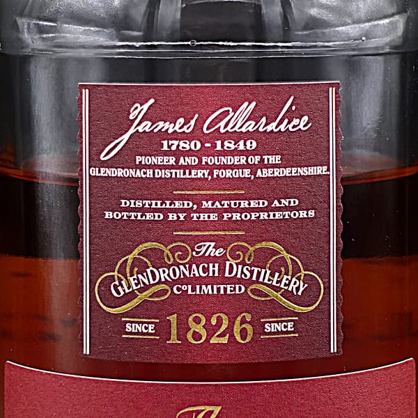 Glendronach 12 year old label detail showing the 1926 founding date and the name of James Allardice, distillery founder