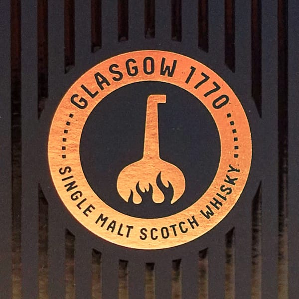 Glasgow 1770 Logo depicting a pot still with an outline of flames at the bottom
