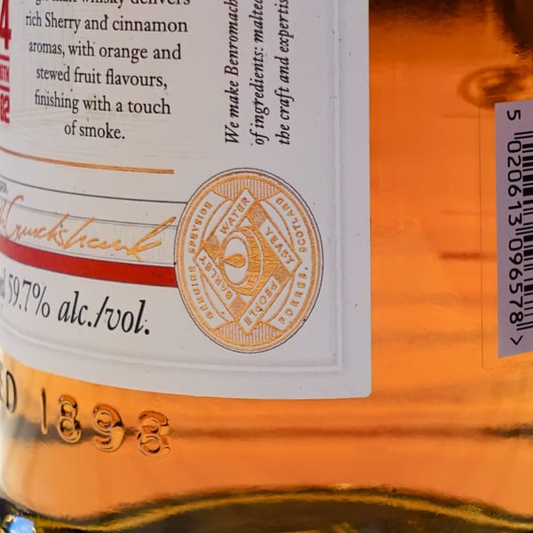 Benromach Cask Strength 2014 vintage label detail showing the "Genuine Speyside" Distillery logo