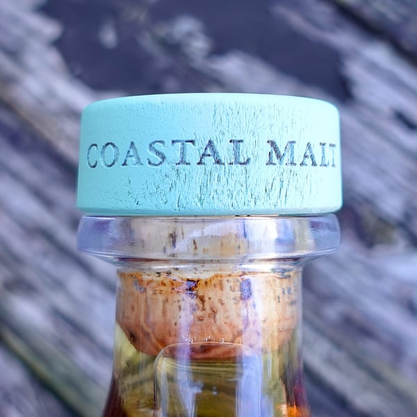 Glanglassaugh Portsoy cap detail showing the coastal malt writing