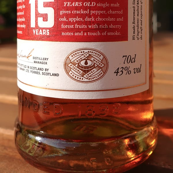 Benromach 15-year-old label detail showing the "geniuinely Speyside" logo