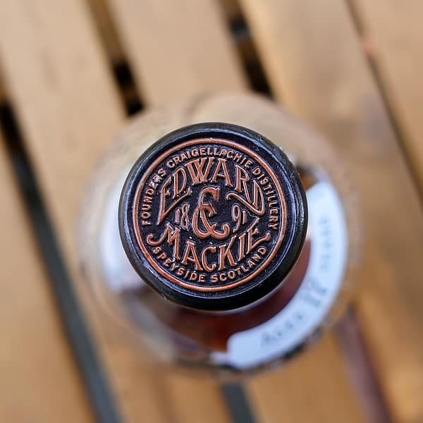 Craigellachie 17 cap seal detail showing the Edward & Mackie brand logo, used when the distillery was established in 1891