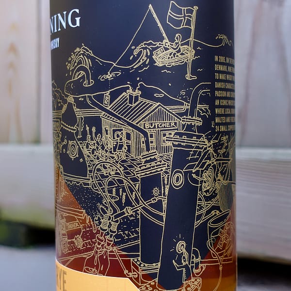 Stauning Floor Malted Rye bottle detail showing the drawing of the shell and tube condensers used in the distillery
