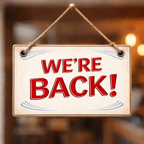 Door sign with the writing "we're back" (AI generated)