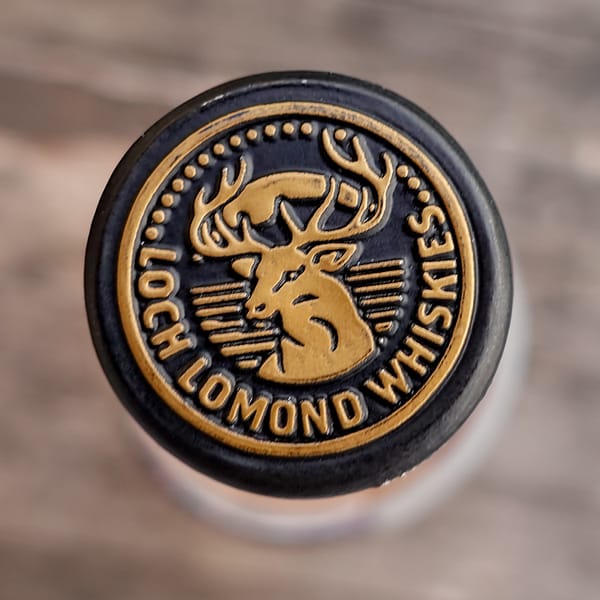 Loch Lomond Steam & Fire stopper seal carrying the distillery' logo stag head