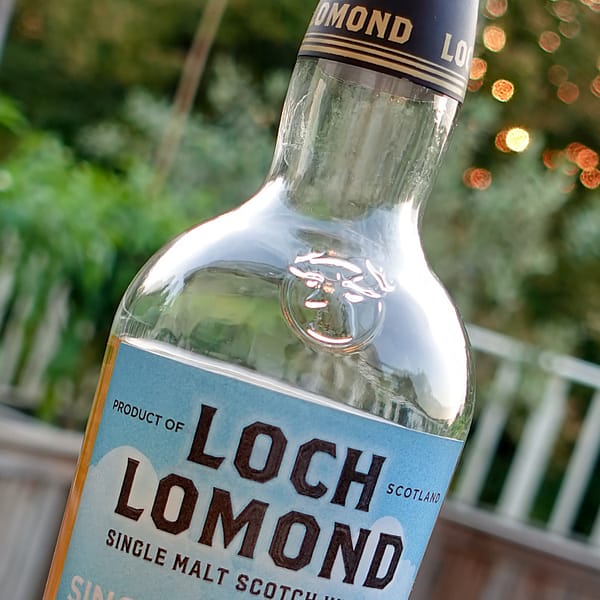 Loch Lomond Steam & Fire Bottle Detail carrying the embossed distillery stag head symbol