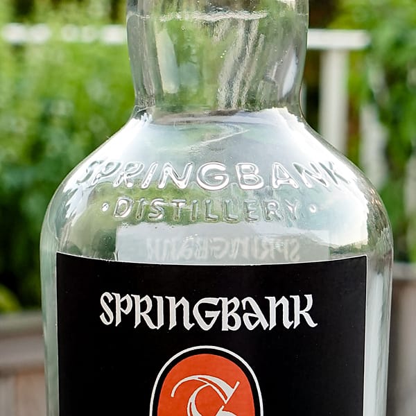 Embossed bottle detail from Springbank 10 showing the "Springbank Distillery" text
