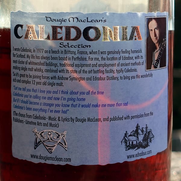 Edradour Caledonia 12-year-old back label detail explaining the story of how the whisky is linked to Dougie MacLean's Caledonia song.
