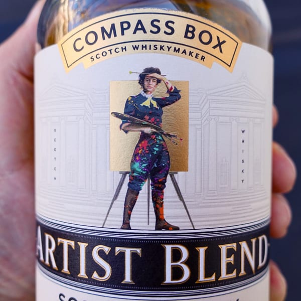 Detail of Compass Box Artist Blend label, showing a painter in front of Edinbourgh's Scottish National Gallery