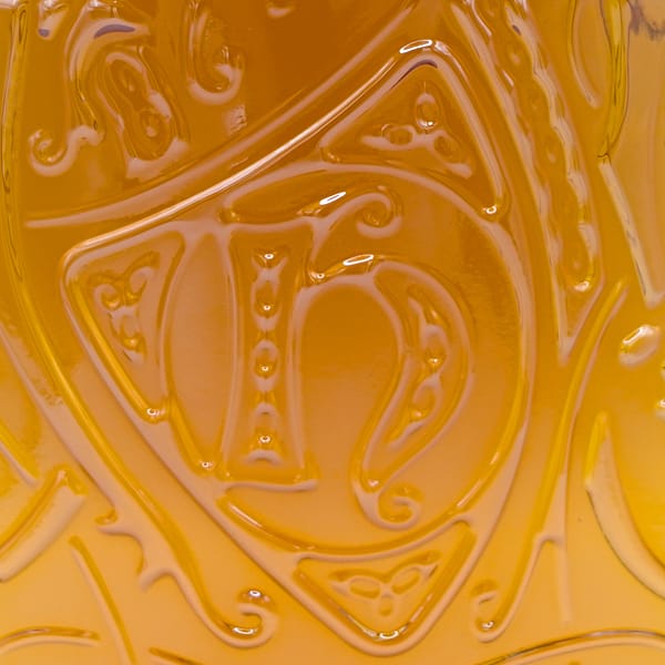 Detail of the Highland Park logo embossed on the bottle glass