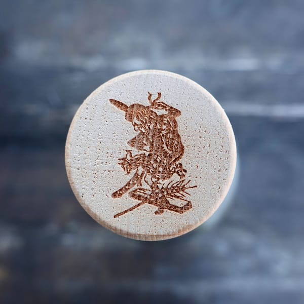 Adelphi's Maclean's Nose stopper showing the "Dancey Man" mascot