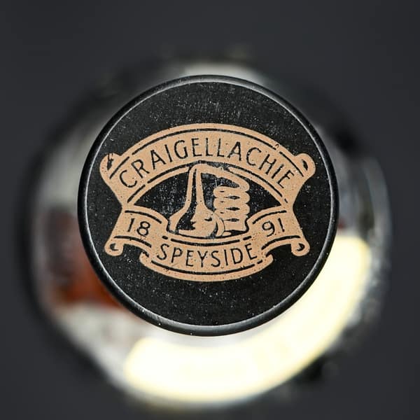 Creigellachie 13 bottle stopper showing the 1891 founding date and a drawing of the still with the famous worm tubs