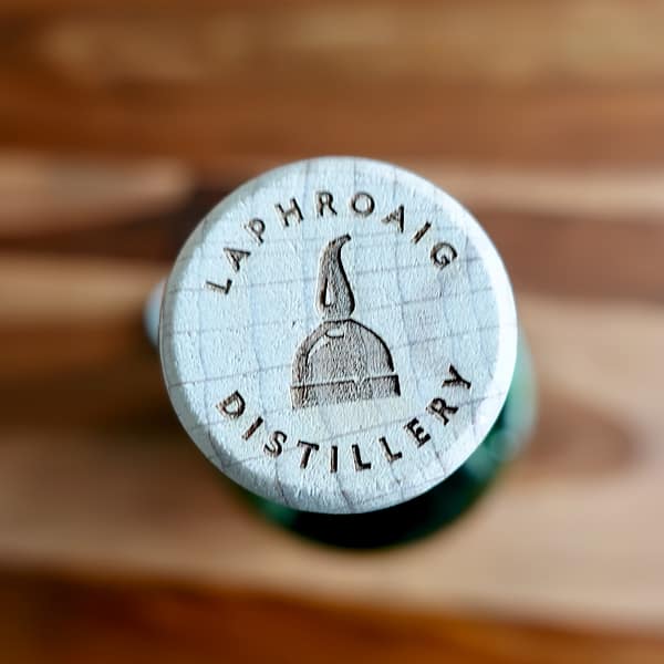 Laphroaig 10 Cask Strength cap showing the distillery logo (2023 rebrand).