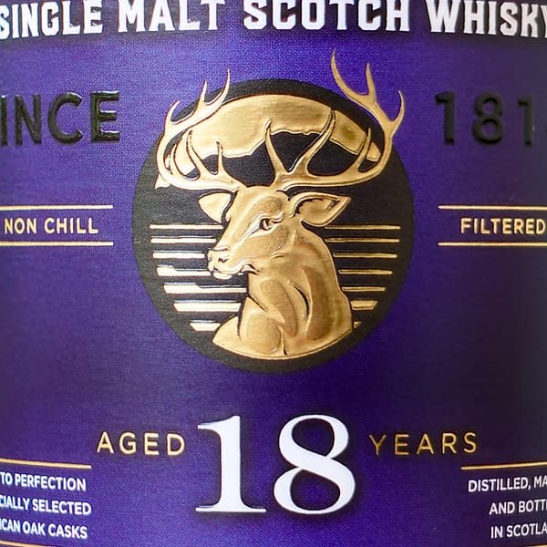 Loch Lomond 18 label detail showing the distillery's stag logo and the "aged 18 years" text