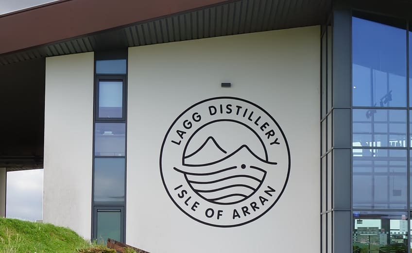 Lagg distillery logo on the wall beside the entrance