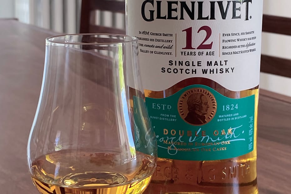 Pic of the Glenlivet 12 Double Oak whisky bottle with a glen cairn glass