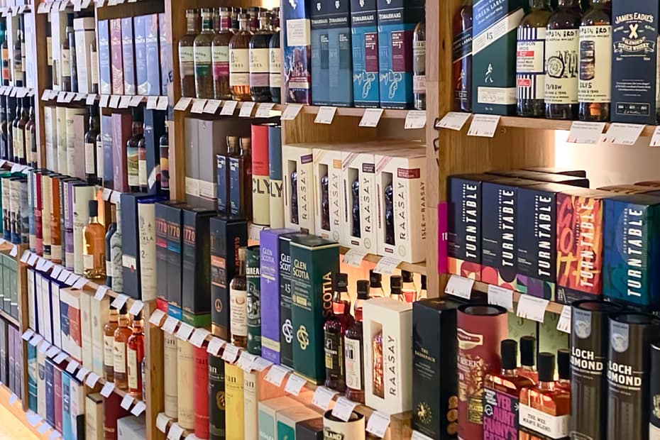 Some of the whisky selection at Glasgow's Good Spirit Company - showing shelves stacked with whisky bottles
