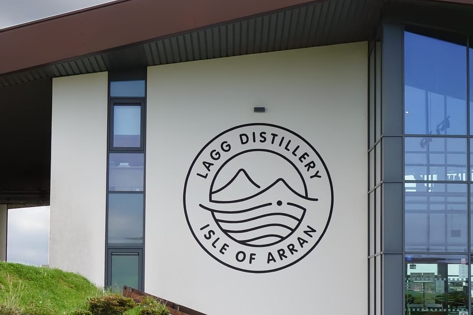 Lagg distillery logo on the wall beside the entrance