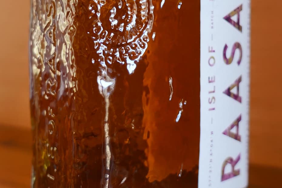 Isle of Raasay R02.1 glass bottle detail showing an imprint of an ammonite fossil