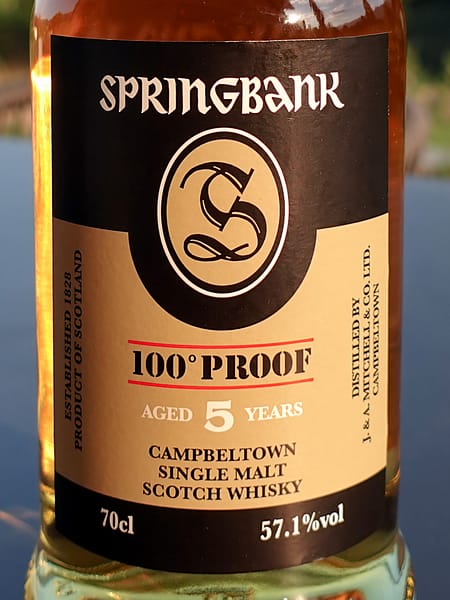 Springbank 100 proof 5 year old front label showing ABV, age and distillery logo