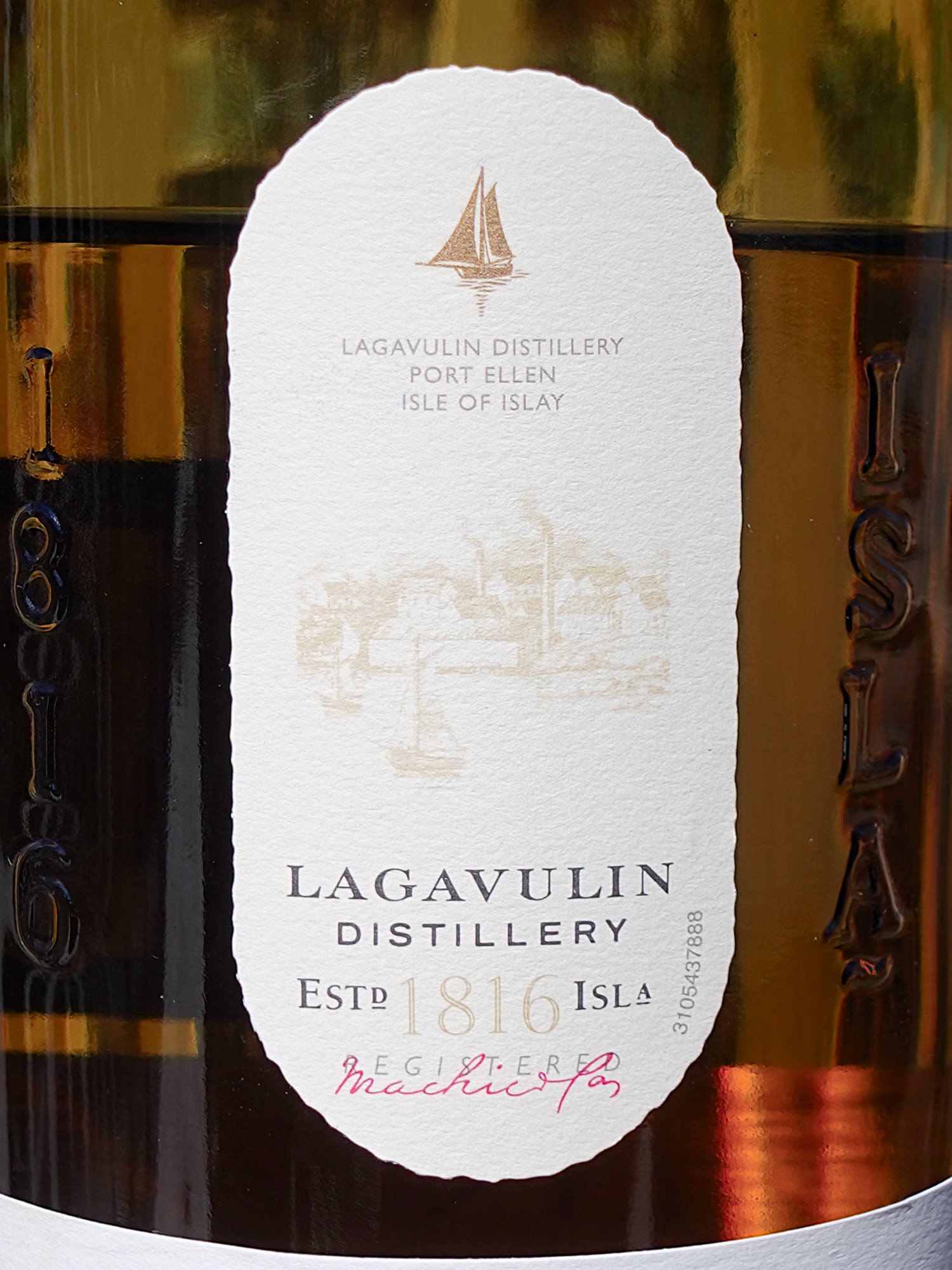 Detail of the Lagavulin 8 top label shoeing the 1816 Set.d date and Port Ellen location of the distillery