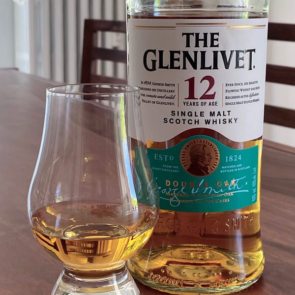 Pic of the Glenlivet 12 Double Oak whisky bottle with a glen cairn glass