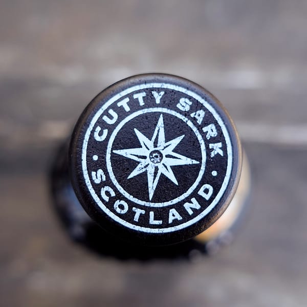 Image of the Cutty Sark Prohibition stopper depicting a compass