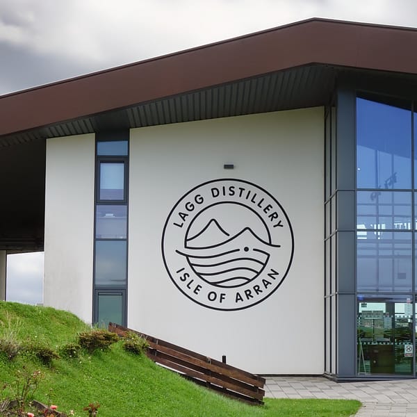 Lagg distillery logo on the wall beside the entrance