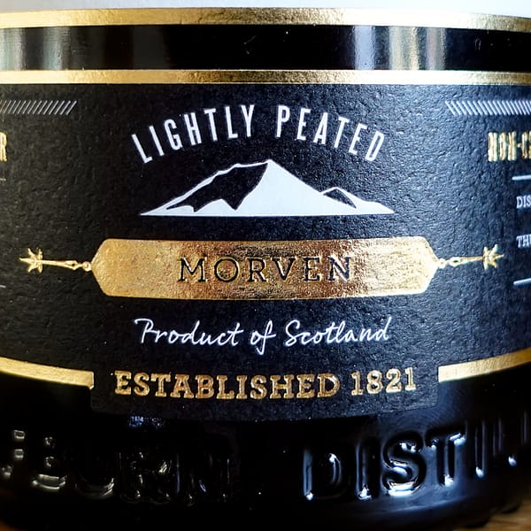 Wolfburn Morven front label detail with the lightly peated statement