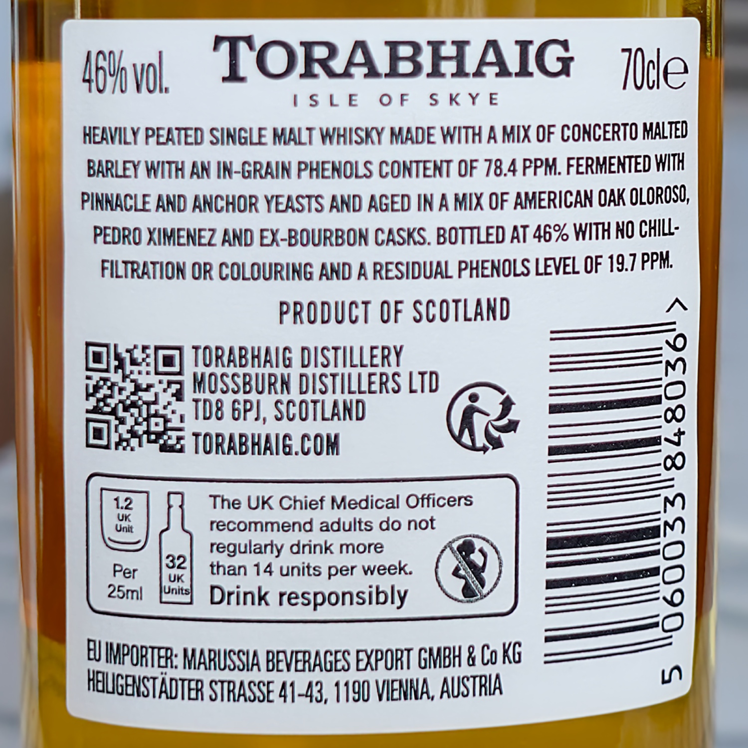 Back label of the Torabhaig Cnoc Na Moine, which explains the various production details including barley used, yeast strains used and ppm before and after distillation