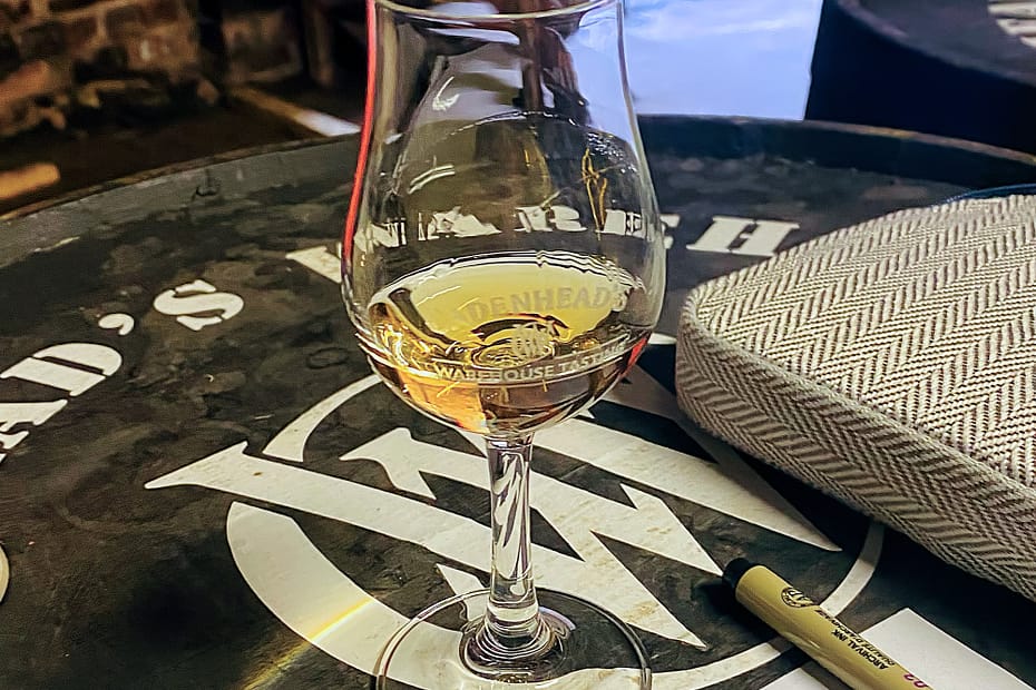 Cadenhead warehouse tasting - copita on top of a Cadenhead branded barrel